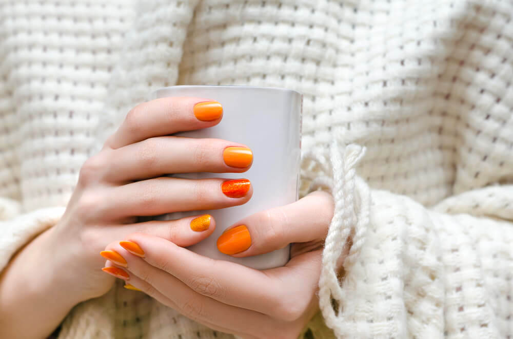 Vibrant orange nail color