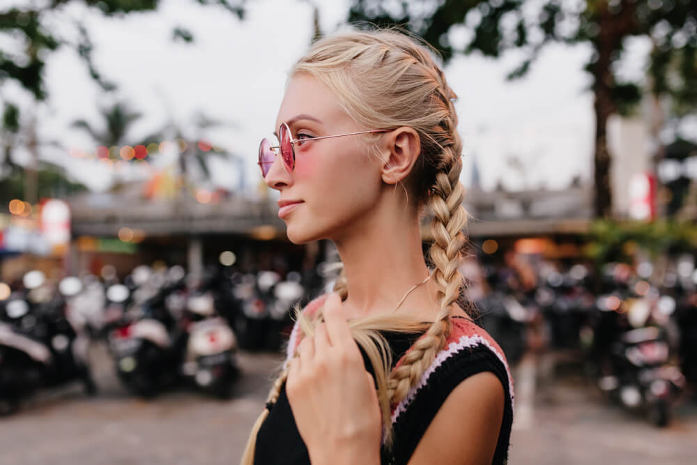 Blonde woman with pigtail braids