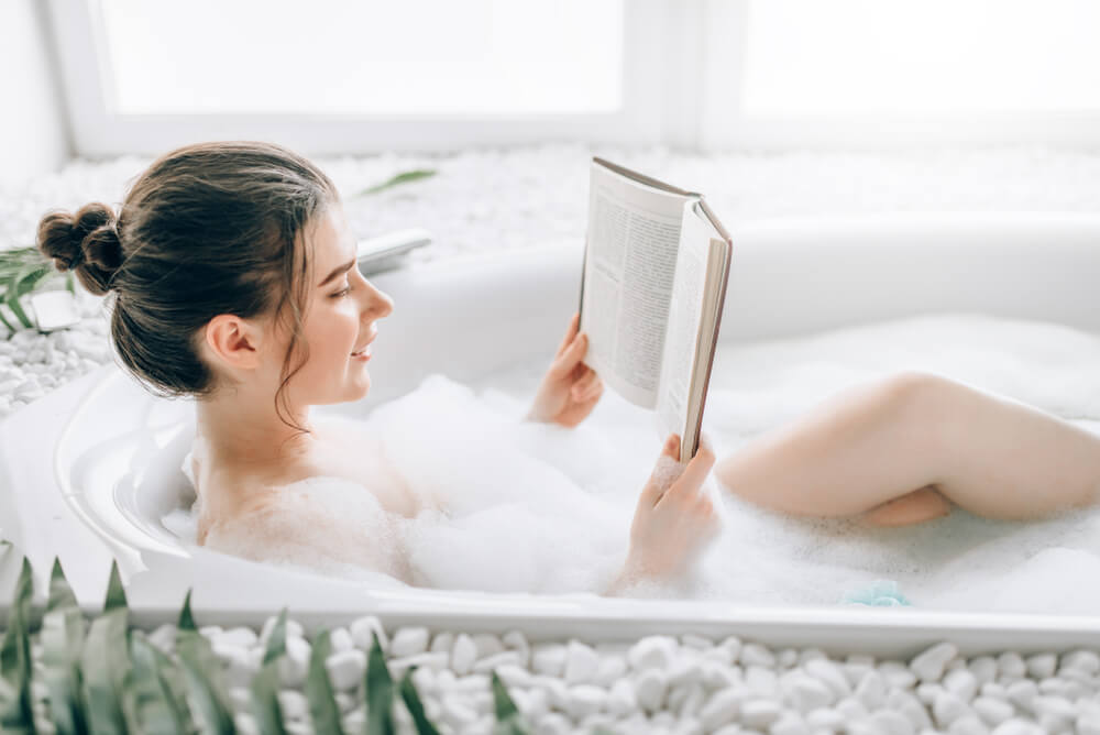 woman bath reading