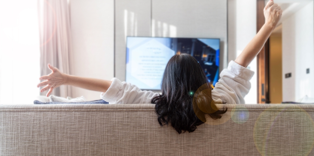 Woman relaxing solo in the morning at home